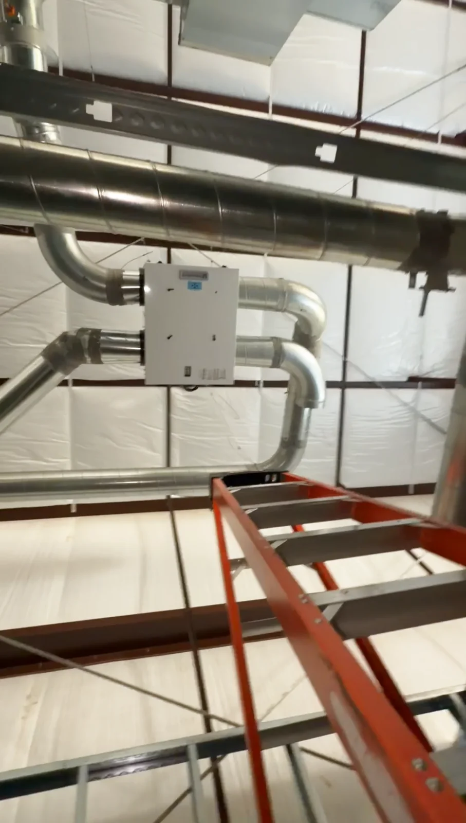 Commercial sheet metal ductwork rough-in during tenant improvement, American Fork DFCM project
