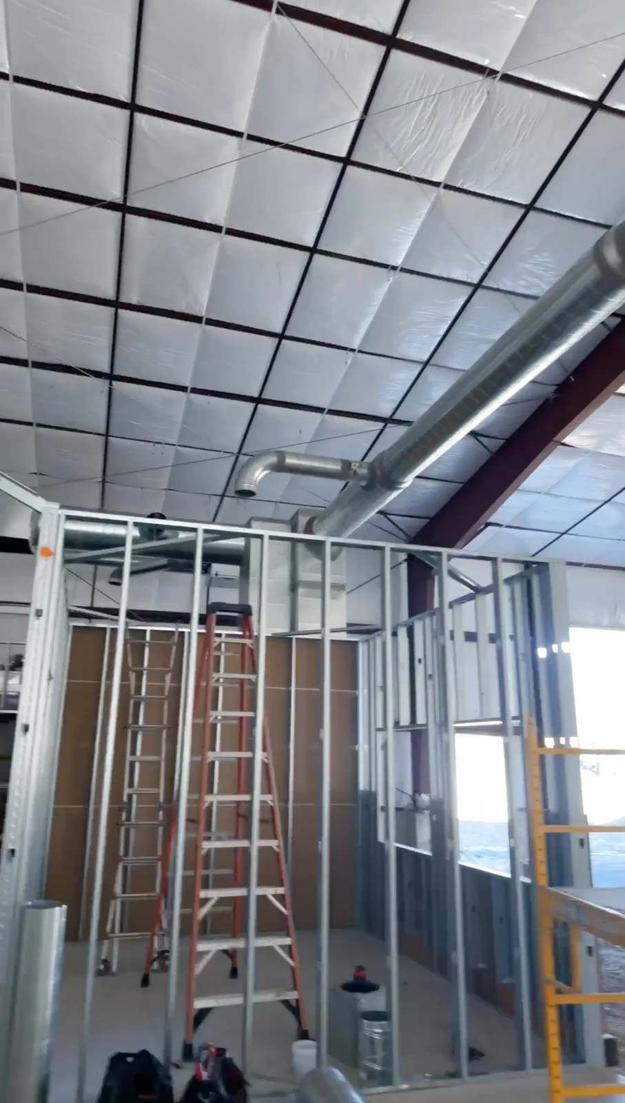 Spiral commercial ductwork with ceiling diffusers on a State of Utah DFCM project in American Fork by Honest Heating & Cooling